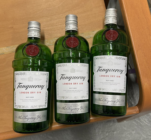 Three tanqueray gin bottles - gin,
