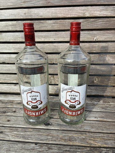 Empty smirnoff vodka bottles - 2,